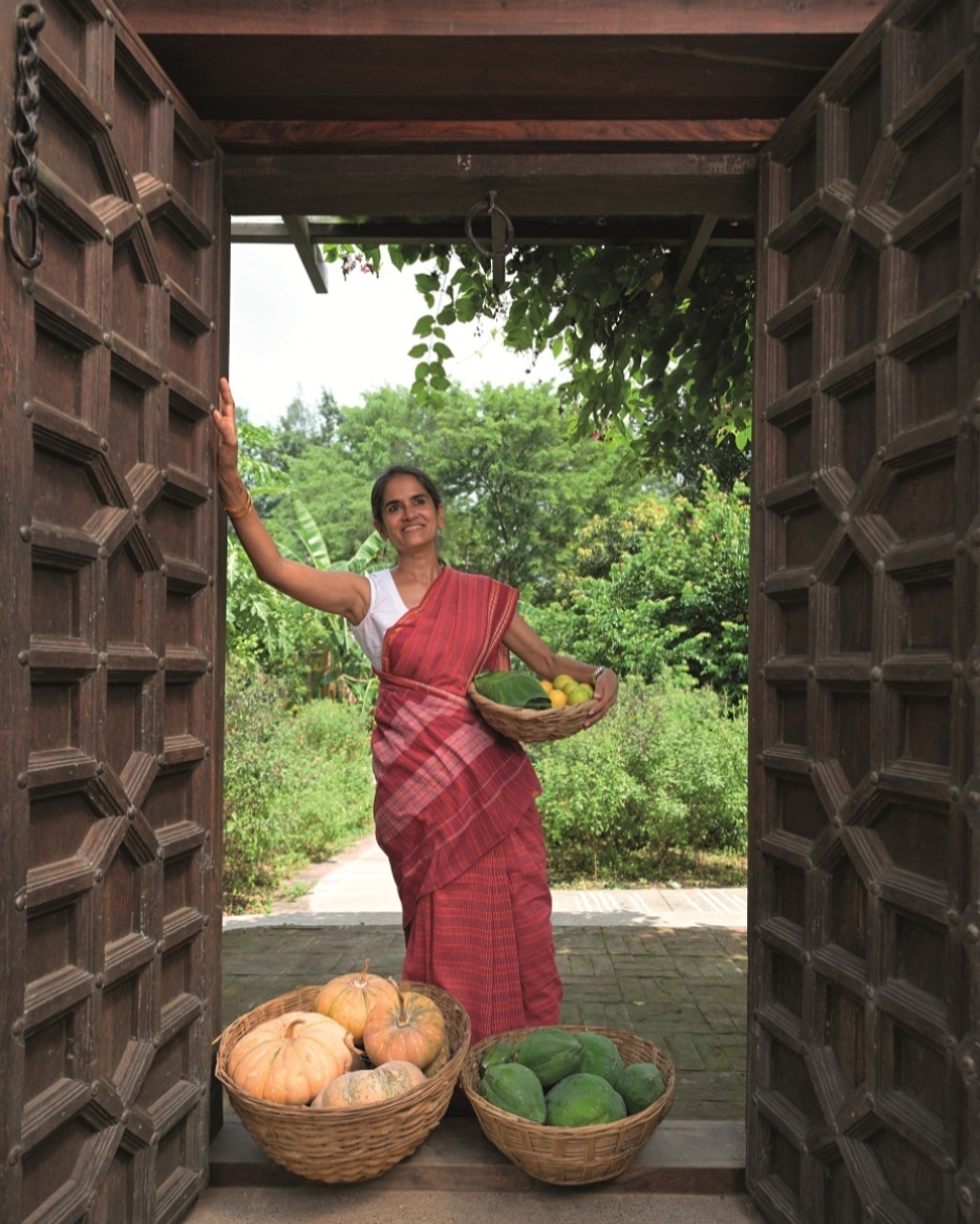 Manisha meditating under a tree at her eco-farm