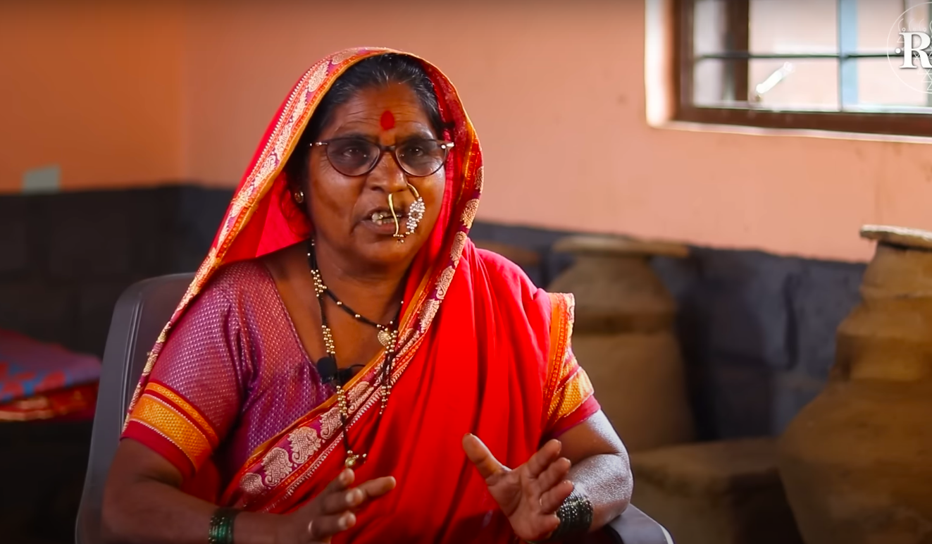 Rahibai Popere with a variety of traditional seeds